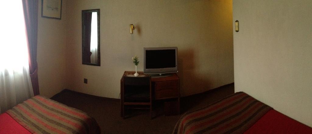 Hotel Mercurio Punta Arenas Habitación foto